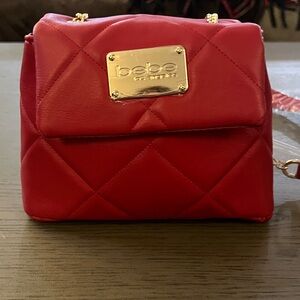 BEBE City Womens Quilted
Faux Leather Shoulder Bag